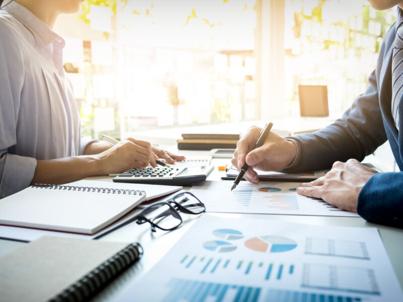 business man financial inspector secretary making report calculating checking balance internal revenue service inspector checking document audit concept